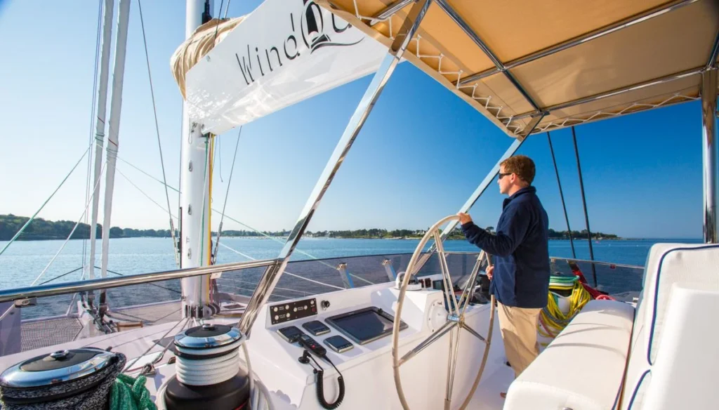 Helm station aboard WindQuest with WindQuest sail cover visible