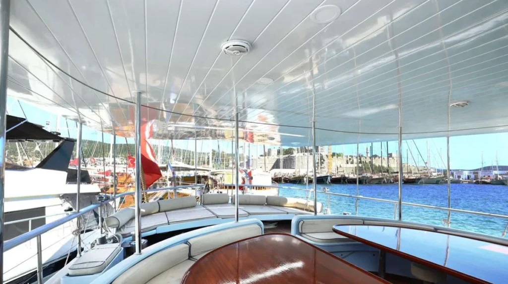 Aegean Clipper covered upper deck seating area overlooking Bodrum marina