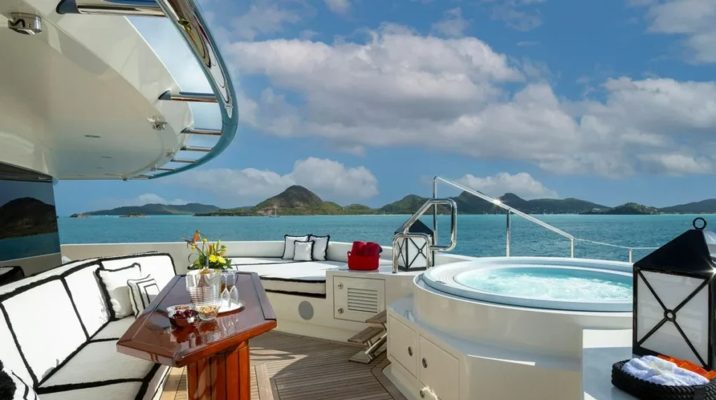 Alfa Nero superyacht bow jacuzzi and lounge seating with a view over the Caribbean anchorage