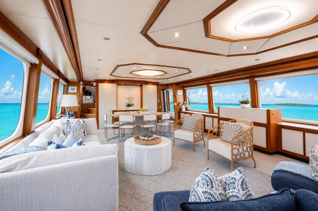 Main salon aboard motor yacht Birdy with open-plan seating and dining area