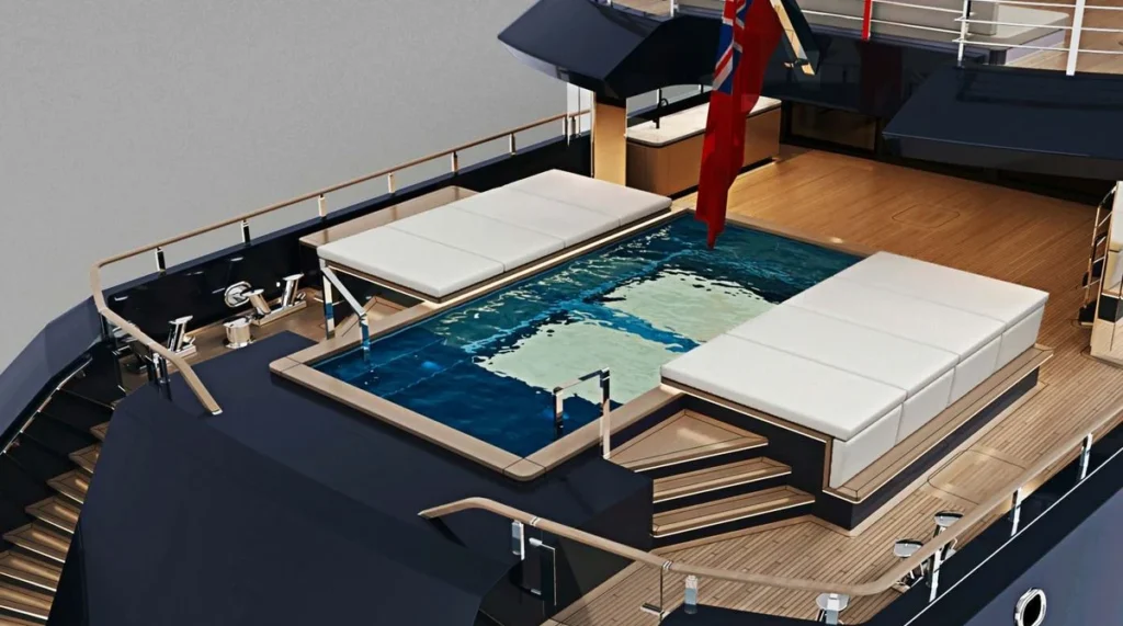 Les Cinq main deck aft glass-bottomed swimming pool and sun loungers