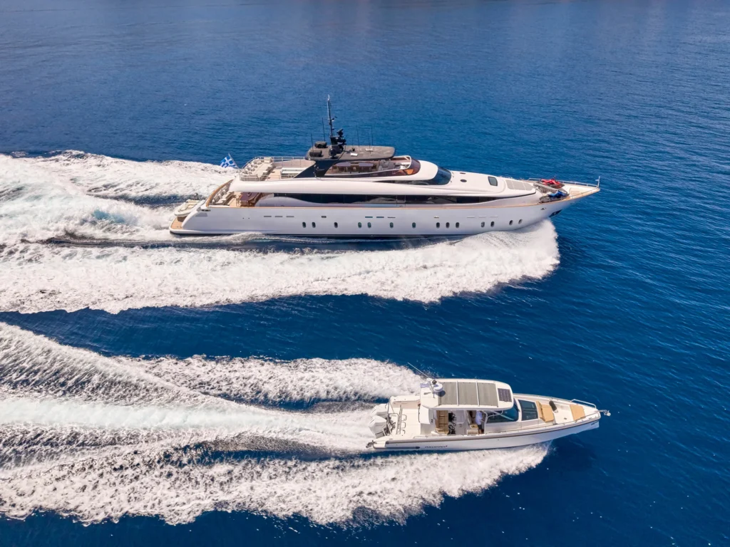 Mamma Mia yacht running alongside her Axopar 37 chase boat in the Aegean Sea