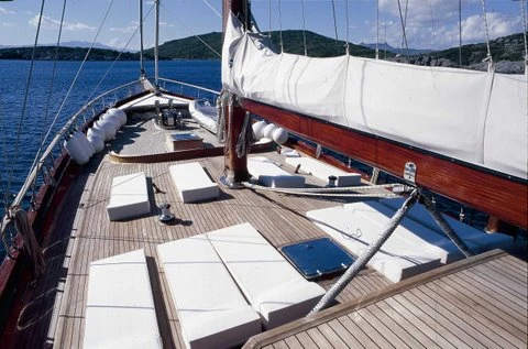 Shaded aft deck dining table aboard Eylul Deniz II