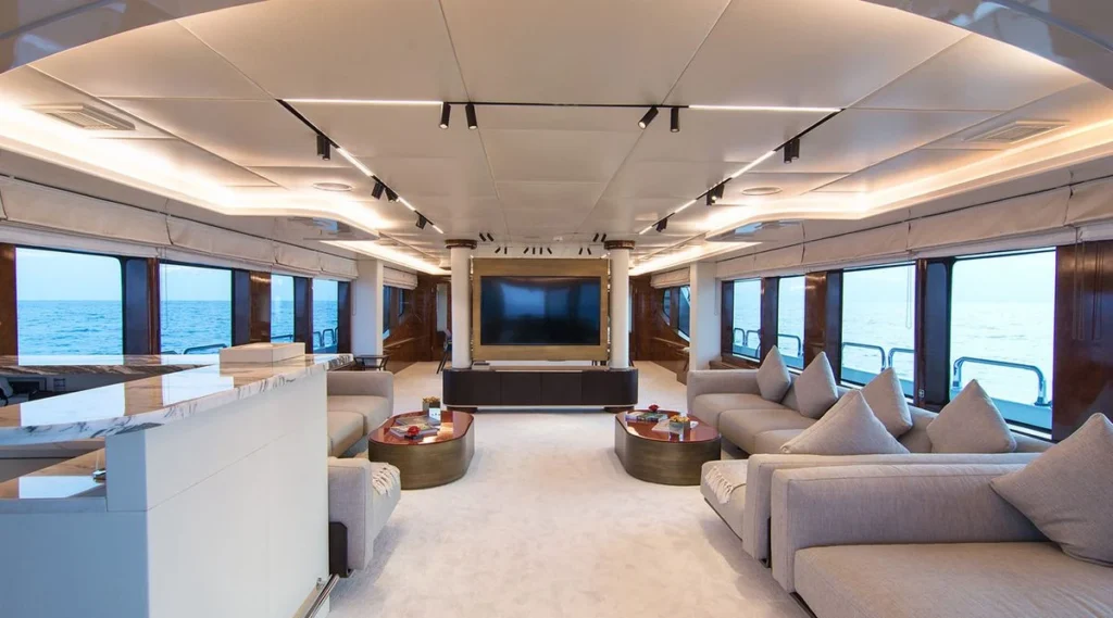 Hallo yacht main salon with sectional seating and entertainment area