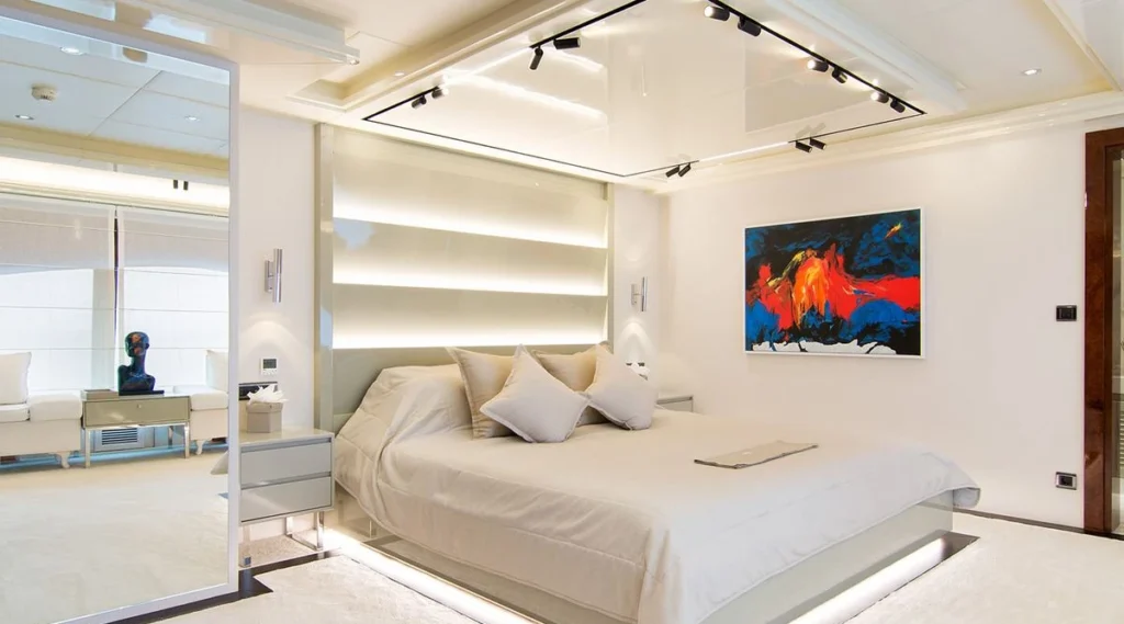 Hallo yacht master cabin with king bed and artwork