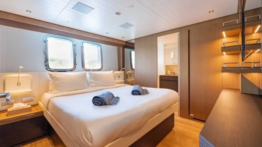 Guest cabin with double bed aboard Journey yacht