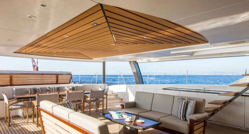 Aft deck lounge and dining area aboard Kokomo sailing yacht