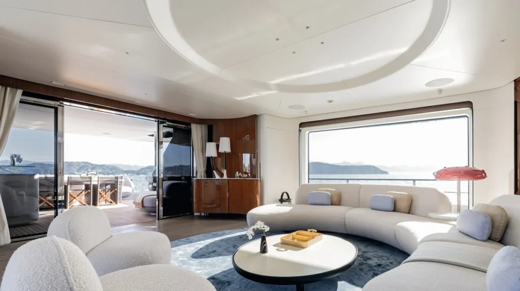 Luz De Mar main salon with curved sofa seating and panoramic windows