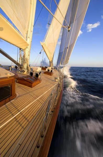 Teak foredeck of sailing yacht Seabiscuit underway